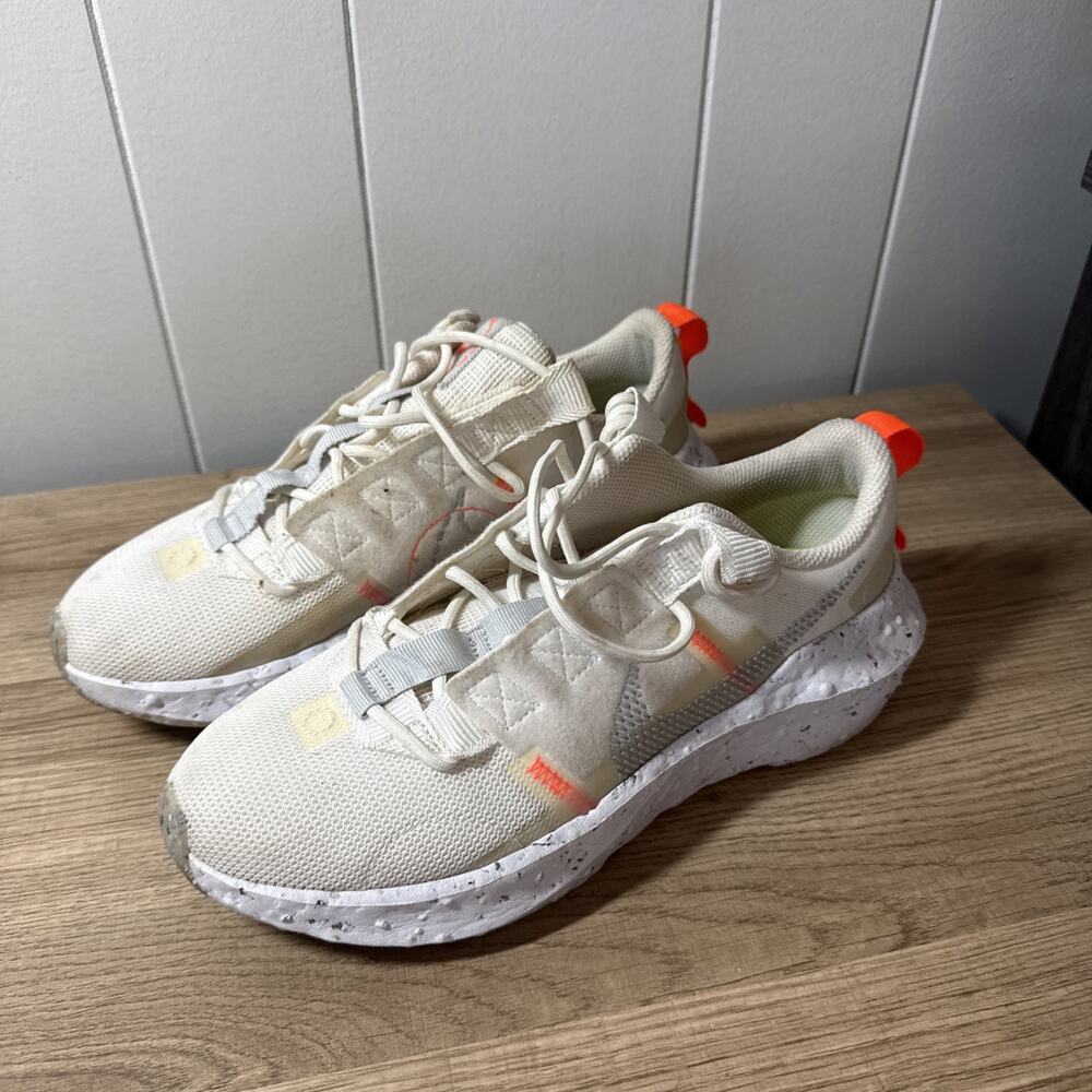 Nike Women's White Sneakers with Orange Accents